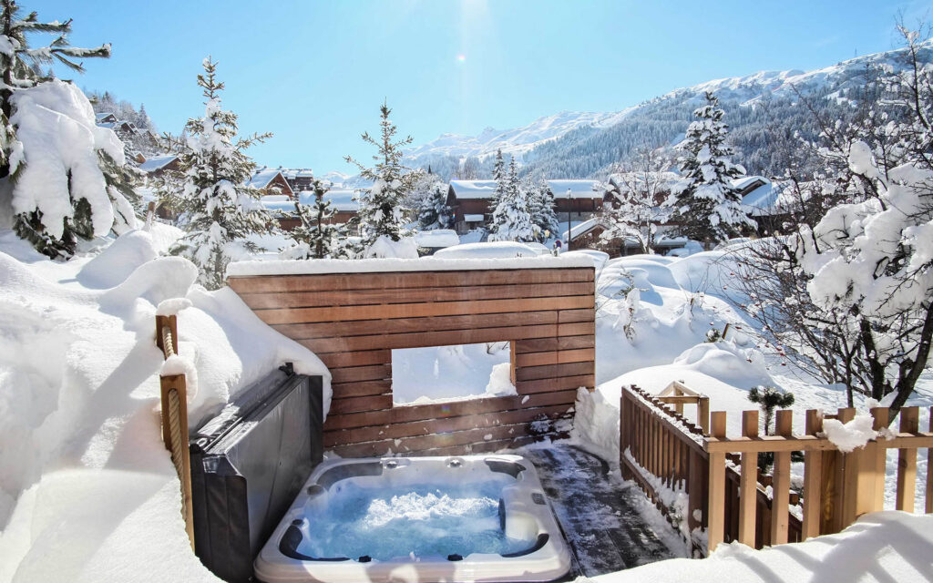 Chalet Caro hot tub in snow